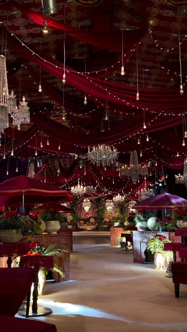 Promise & Petals on Instagram — Step into a royal romance. 🥀✨  Dripping in deep crimson velvet, cascading crystals, and a warm, ambient glow, this setup